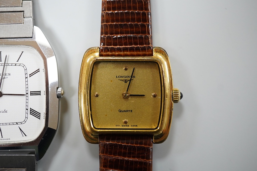 A gentleman's recent stainless steel backed Longines quartz wrist watch, with Roman dial, case diameter 31mm, on a steel bracelet, together with a lady's steel and gold plated Longines quartz wrist watch, case diameter 2